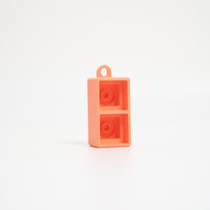 Layr 3D Fidget Clicker 1×2 in orange, 3D printed keycap fidget keychain with 2 keys
