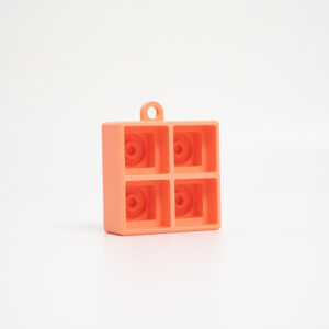 Layr 3D Fidget Clicker 2×2 in orange, 3D printed keycap fidget keychain with 4 keys